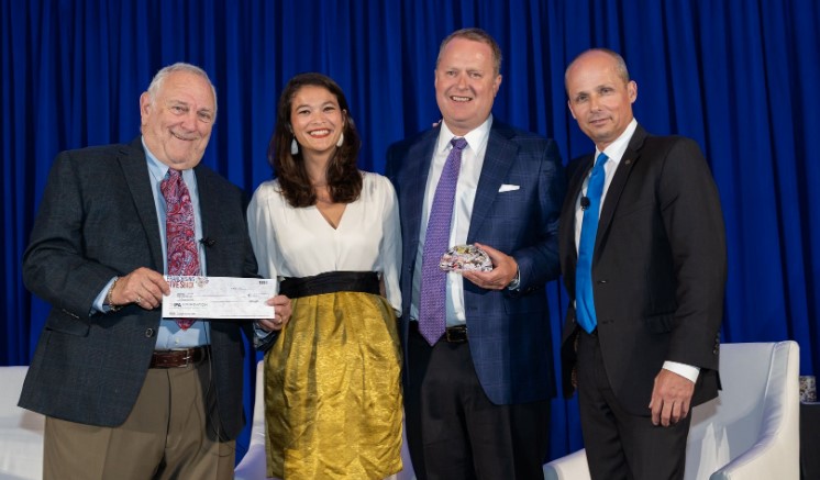 Premium service brand employees accepting an award