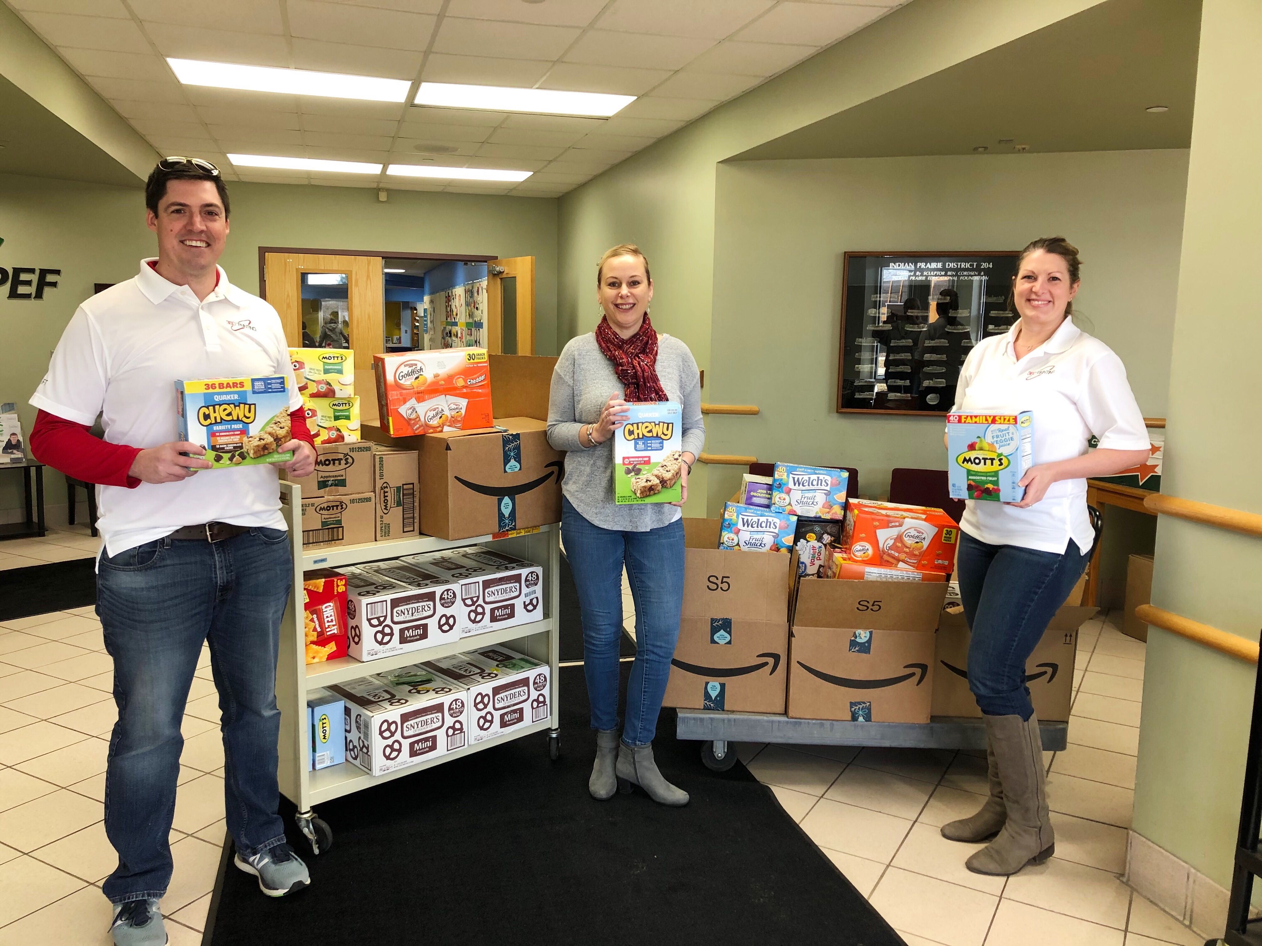 Apple, books, blocks, and pencils on a desk