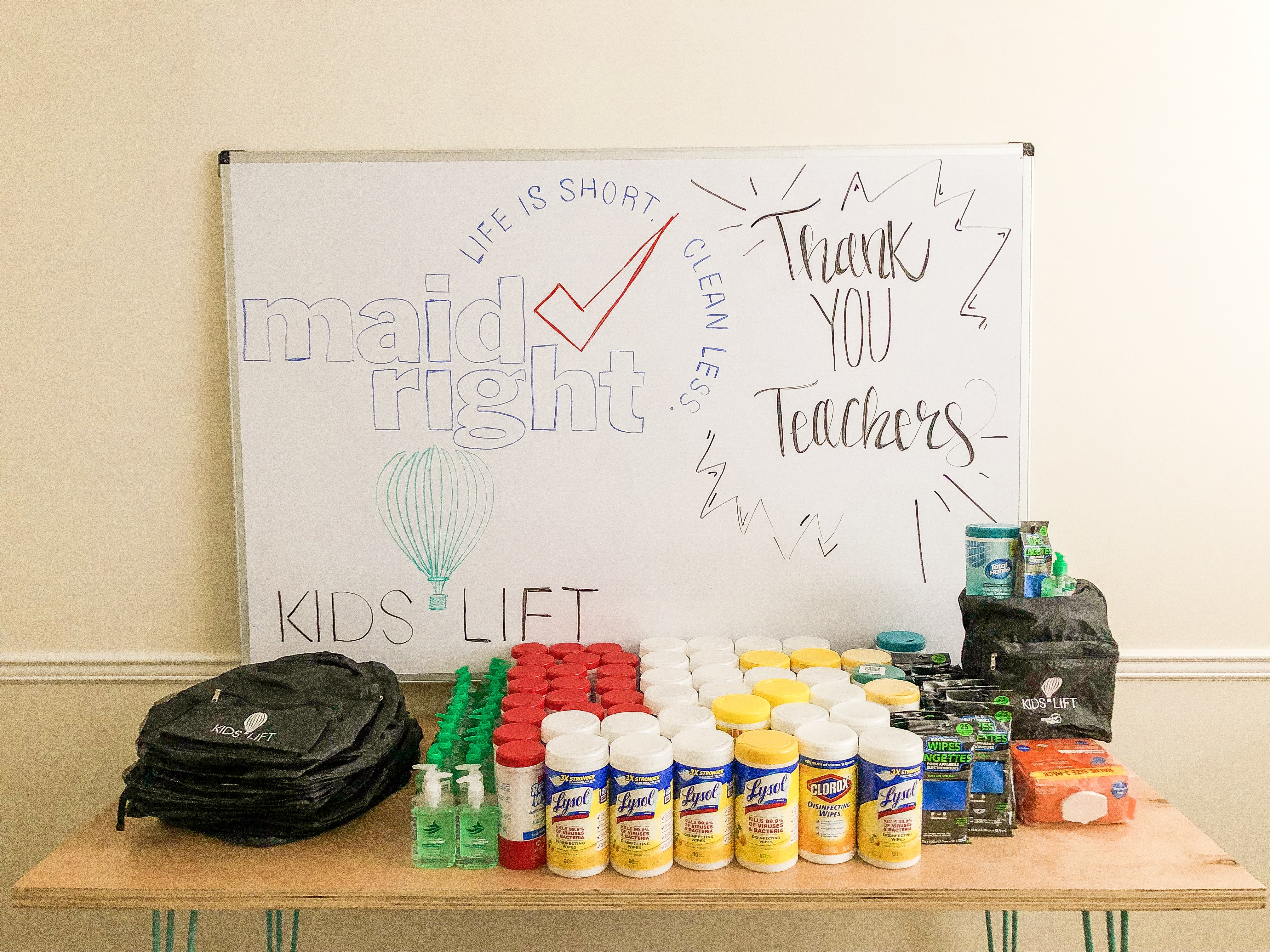 Hand sanitizer bottles and complimentary mints are arranged in a bowl