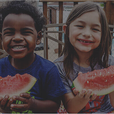 Smiling Kids with watermelon